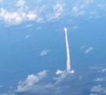 乘客观看阿耳忒弥斯二号从商用飞机上升空